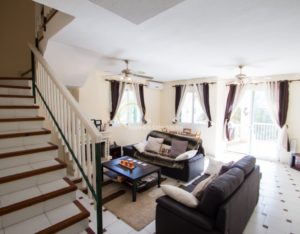 A semi detached villa with living room stairs and a couch, near Alicante.