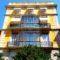 Yellow building, balconies, Valencia real estate.