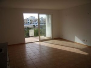 BALEARES - Spacious apartment in the Centre of Menorca with sliding glass doors and tiled floors.