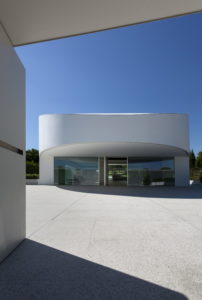 A circular white building, your architect design dream house in Spain.