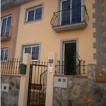Bank property: Terraced house with balconies and wrought iron railings in Tenerife.