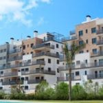 A large apartment complex with a swimming pool located in Costa Blanca South's Mil Palmeras.