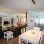 A detached 4-bedroom villa with a living room and dining area for sale in Tolox.