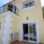 A detached villa in Mijas Costa with a balcony.