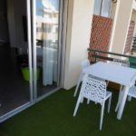 Beautiful 3 bedroom apartment in Tenerife,Los Cristianos with a balcony and grass seating area.
