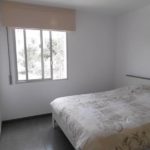 A beautiful bedroom with a bed and a window.