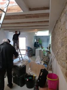 A group of people are working in a room to find Costa Blanca property.