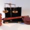 A judge's gavel and a briefcase representing property law in Spain on a white background.