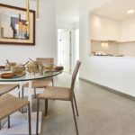 A new build apartment in Cala d'or with a dining table and chairs.