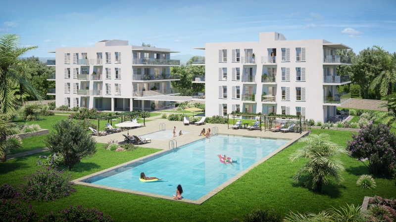 A new build apartment complex in Cala d'or featuring a swimming pool.