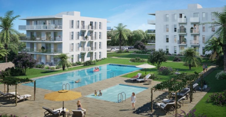 A rendering of a new build apartment complex in Cala d'or with a swimming pool.