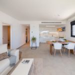 A modern living and dining room in an Alicante New Build Apartment.