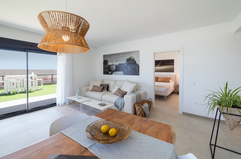A modern apartment with a living room and dining room in Gran Alicante.