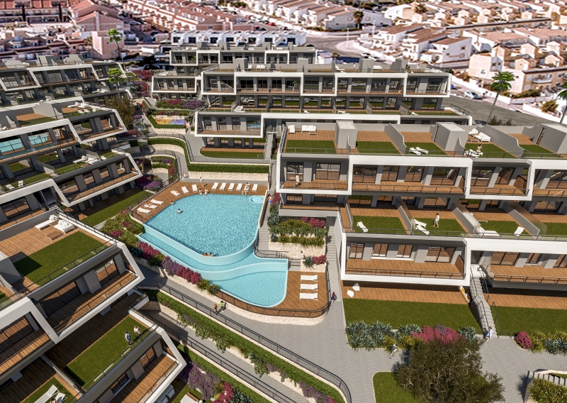 An aerial view of a new build apartment with a pool in Alicante.