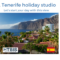 View of Tenerife's coastal landscape with palm trees, houses, and mountains in the background, accompanied by the Spanish flag and logo of HTBIS. Overlaid text reads, "A Tenerife holiday studio. Let's start your day with this view." Perfect for real estate shoppers in Tenerife looking to explore paradise.