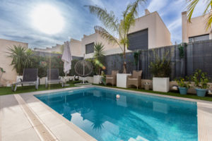 A swimming pool in the backyard of an Orihuela Costa villa.