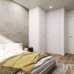 A bedroom in an Alicante New Build Apartment with wooden floors and a bed.
