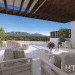 A rendering of a patio with furniture and a view of the mountains from a new build townhouse in Mijas.