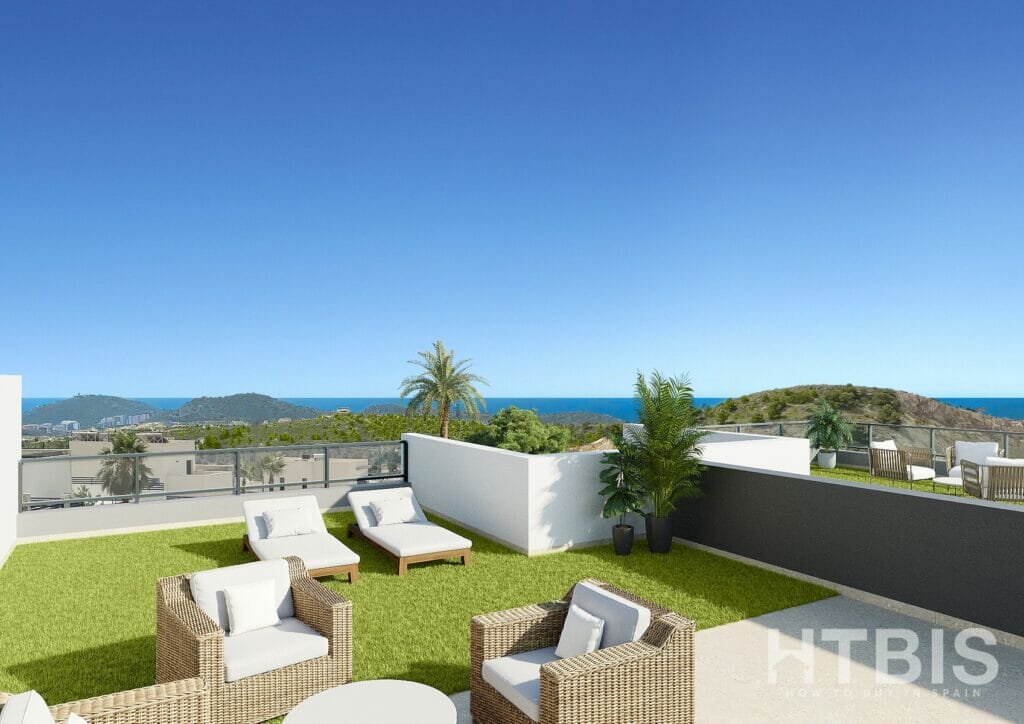 A rendering of a terrace with furniture and a view of the ocean in a Benidorm new build apartment.