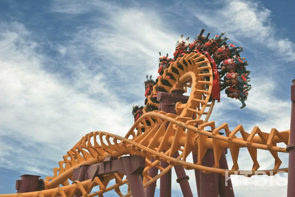 An amusement park roller coaster in the sky near a Benidorm New build apartment.