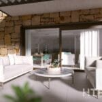 A rendering of an apartment patio in Malaga with white furniture and a stone wall.