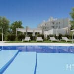 A 3d rendering of a swimming pool in front of a Malaga New Build apartment building.