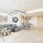 A modern living room in a Marbella New Build apartment with a grey couch and dining table.