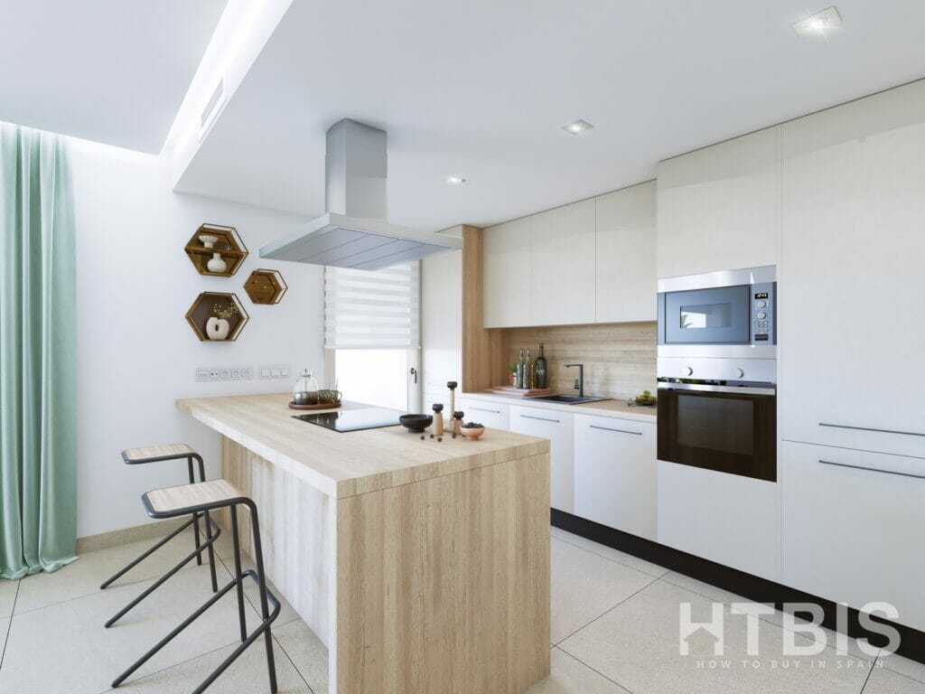 A modern kitchen in a Marbella New Build apartment with white cabinets and wooden counter tops.