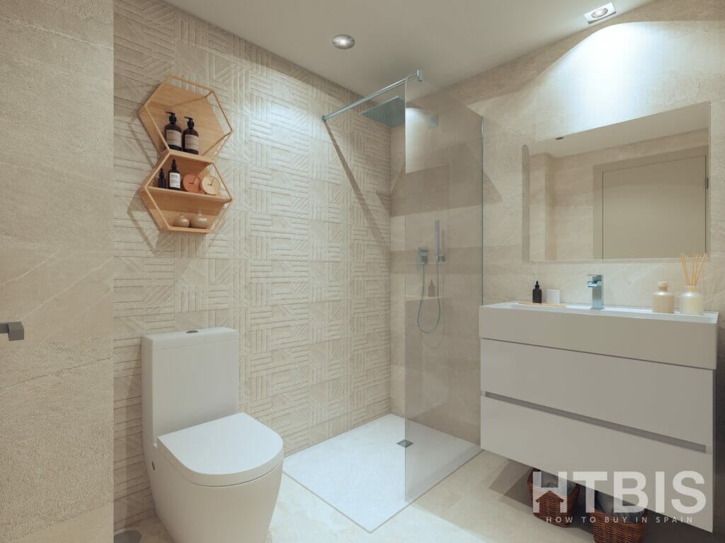A bathroom with a toilet, sink, and shower in a Fuengirola New Build apartment.