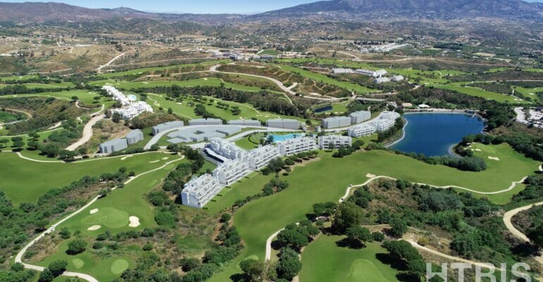 An aerial view of a golf resort in Marbella, featuring a New Build apartment.