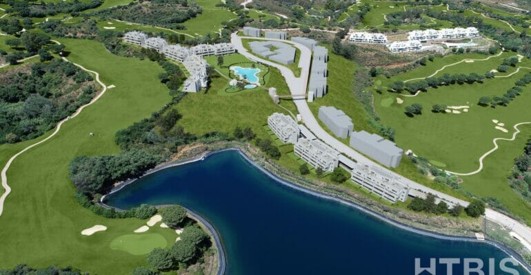 An aerial view of a golf course and a lake, with Malaga New Build Apartments in the background.