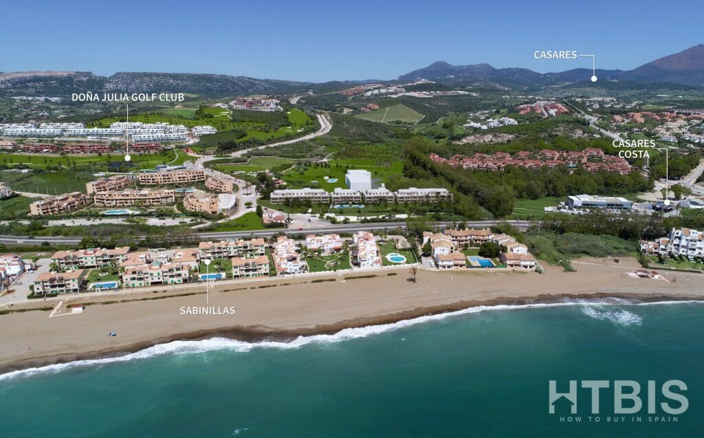 An aerial view of a resort, the Estepona golf course, and the beach.