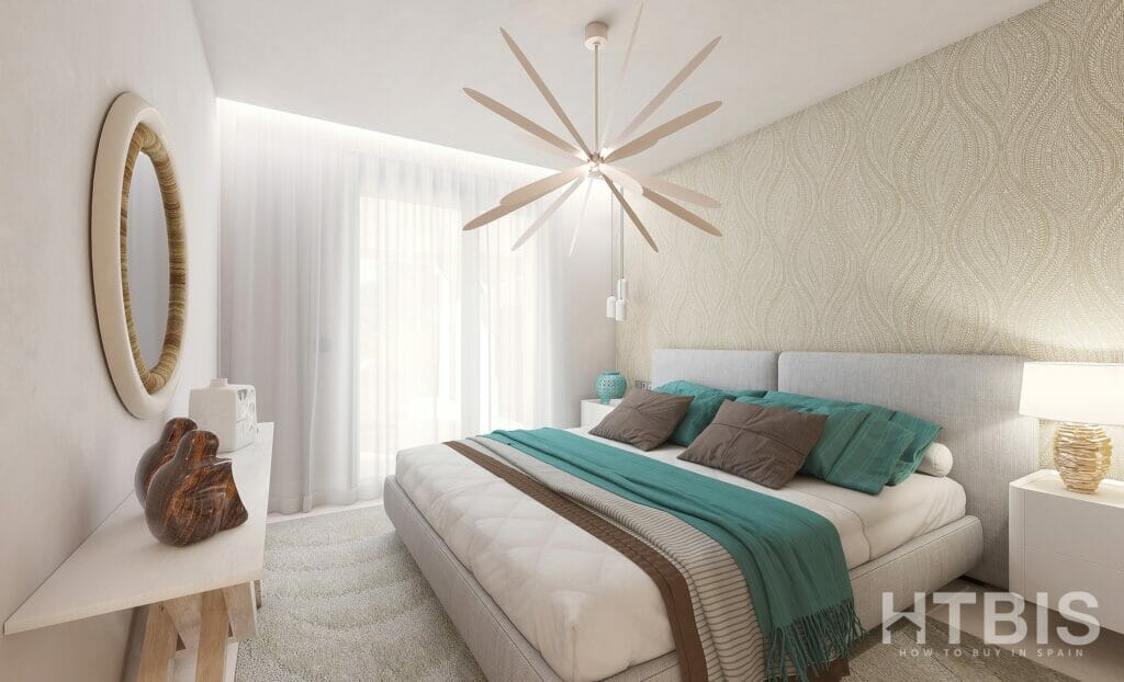 A modern apartment bedroom overlooking the Estepona Golf Course, with a bed and a bedside table.