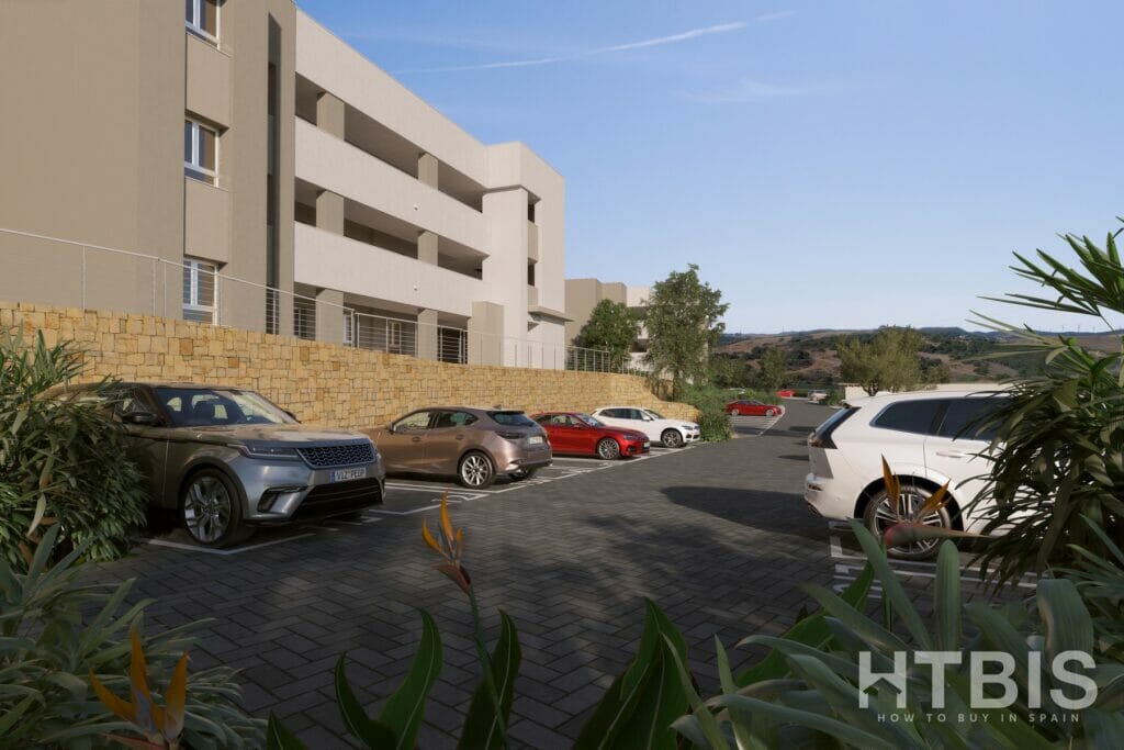 A rendering of an Apartment Estepona Golf Course complex with cars parked in front of it.