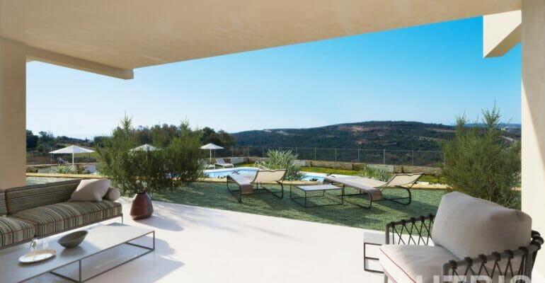 A large patio with furniture and a view of the Estepona mountains.